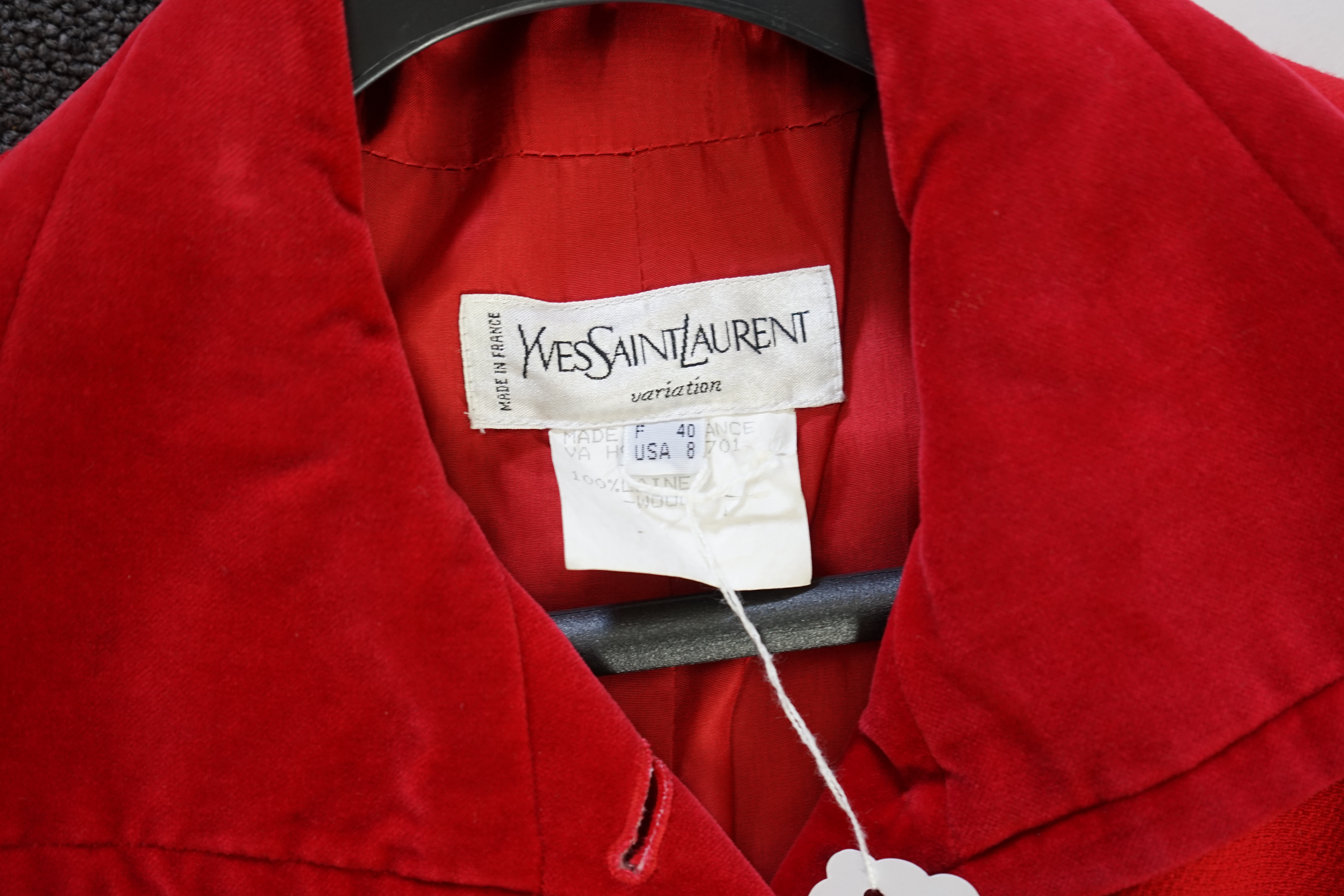 A vintage Yves Saint Laurent variation lady's red wool coat with velvet trim, F 40 (UK 12). Proceeds to Happy Paws Puppy Rescue